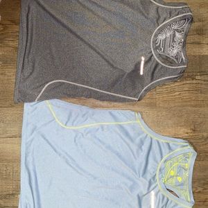 4 large workout tanks Nike, brooks and yogalicious
